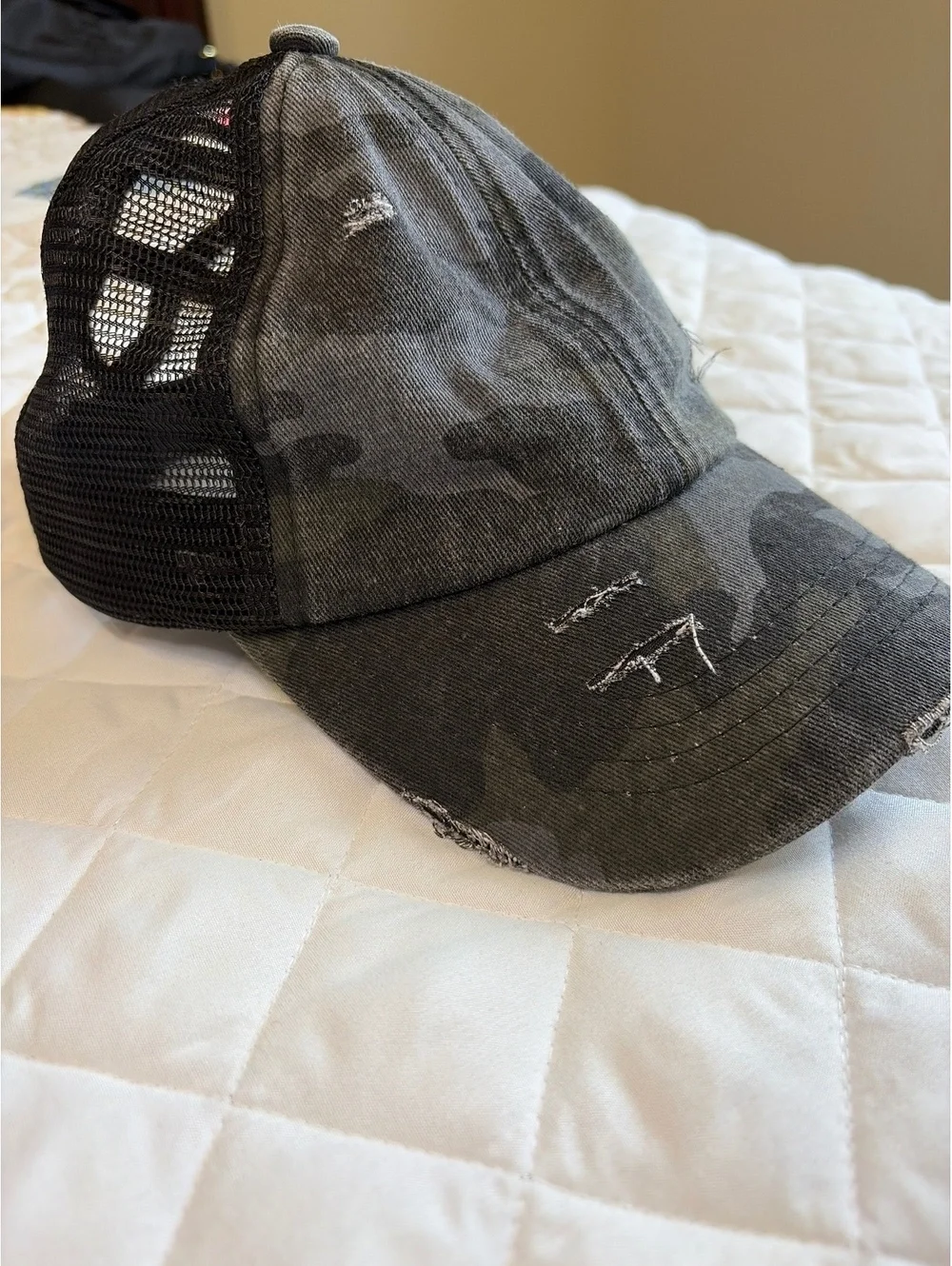 C.C. Distressed Camo Ponytail trucker hat